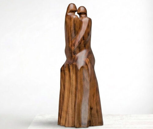 Escultura de madera pareja