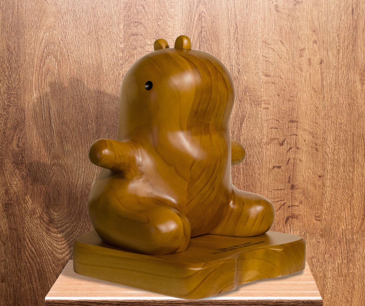 Esculturas dinosaurio en base